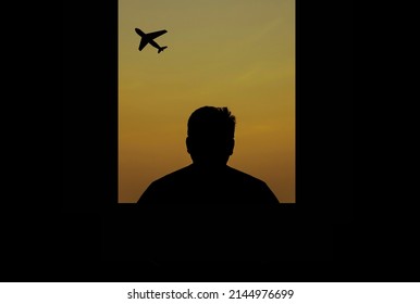 Man Alone Looking At The Plane Through The Window And Silhouette