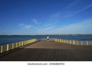                    Man alone looking the river in Ayamonte            