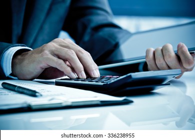 Man Analysis Business Accounting - Shutterstock ID 336238955