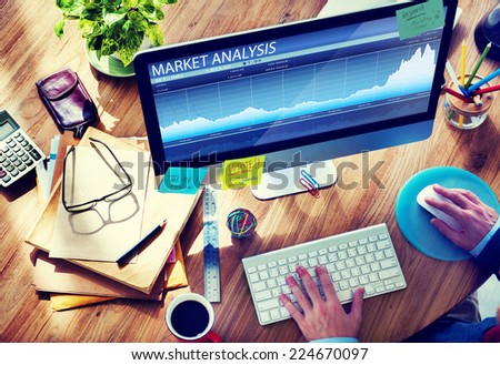 Man Analysis the Market on Computer