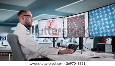 Man Analyzing Protein Structures On Multiple Computer Screens In Lab Possible Professions: Scientist, Researcher