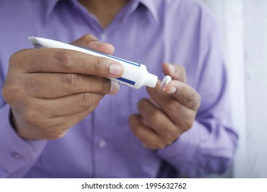 Man Applying Antibiotic Cream Close Up