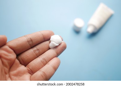 Man Applying Antibiotic Cream Close Up