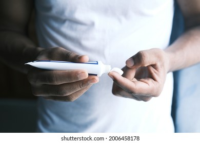 Man Applying Antibiotic Cream Close Up