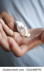 Man Applying Antibiotic Cream Close Up