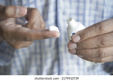 Man Applying Antibiotic Cream Close Up