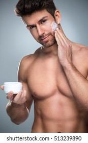 Man Applying Face Cream
