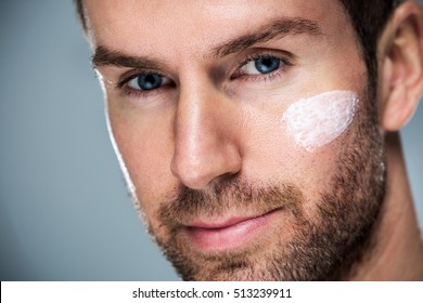 Man Applying Face Cream
