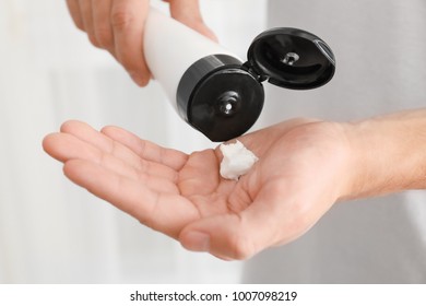 Man Applying Hand Cream, Closeup