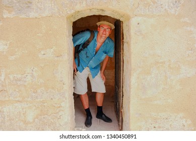 Man In The Arch Of The Doorway In Fortaleza De San Carlos De La Cabana (Fort Of Saint Charles). Havana, Cuba - August 31, 2012