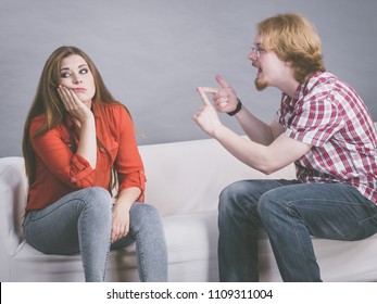 Man Arguing With His Girlfriend. Female Being Bored, Irritated Because Of His Bossy Boyfriend.