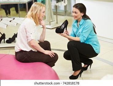 Man And Assistant At Shoe Shopping