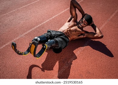 Man athlete with prosthetic legs crunching. Disable athletetic man exercise at sport stadium. Black man has disable leg, crunching exercise. African american athletetic wear black sportswear crunching - Powered by Shutterstock