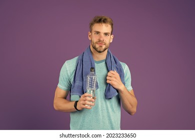 Man Athletic Hold Water Bottle. Handsome Athlete Drink Water. Water Balance. Sport For Better Life. Thirsty Man. Athlete Hold Bottle. Body Hydration. Refreshing Vitamin Drink After Great Workout