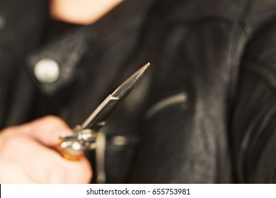 man attack with knife photomanipulation - Shutterstock ID 655753981