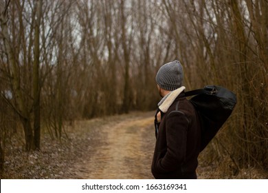 Man in the autumn wood