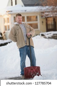 Man With Back Pain From Shoveling Snow