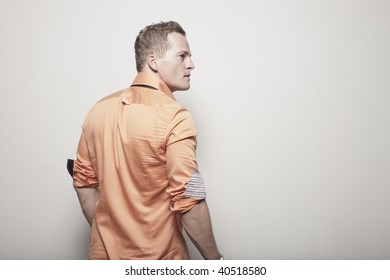 Man With Back Turned Towards The Camera