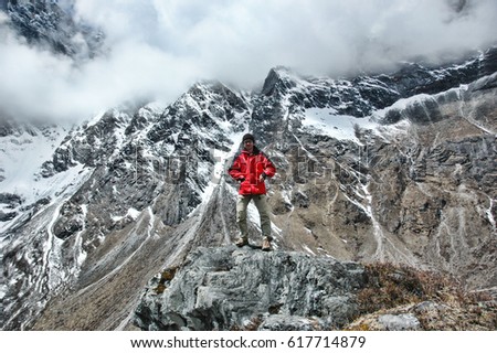 Similar – Image, Stock Photo Backpacker resting.