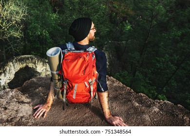 Man with a backpack in the forest