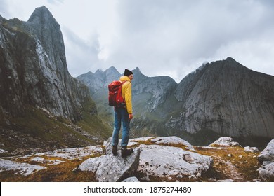 Man With Backpack Hiking Solo In Norway Mountains Travel Vacations Outdoor Adventure Trekking Active Healthy Lifestyle Weekend Getaway 