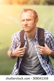 Man with backpack portrait