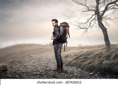 A Man With Backpacker