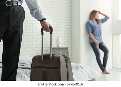 Man With Baggage Leaving His Wife