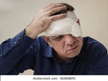 Man With A Bandaged Head And Eye Patch