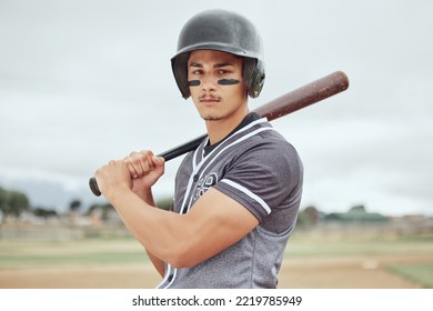 Man, baseball player and sports bat for game, match or training on the pitch in the outdoors. Professional male in baseball for competitive sport ready to play ball for fitness, exercise or workout - Powered by Shutterstock