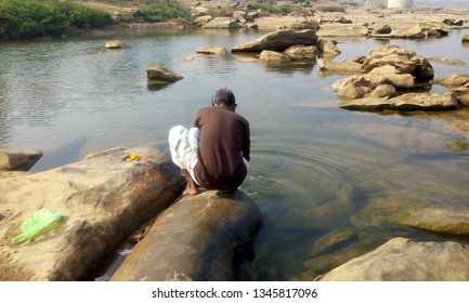 A man is bathing