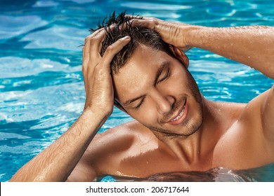 Man Bathing Washing Swimming In Tropical Spa Resort