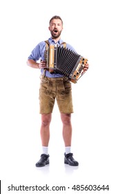Man in bavarian clothes playing accordion and singing. Oktoberfe