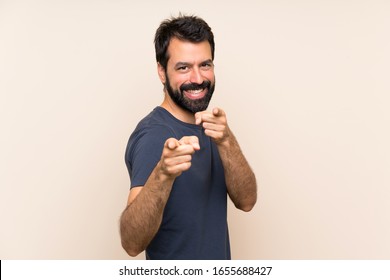 Man With Beard Points Finger At You With A Confident Expression