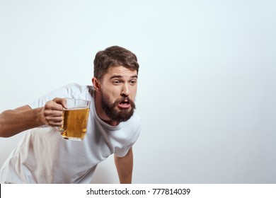 man with a beer on a white background, alcoholism                     
