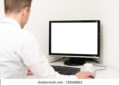 man behind computer with white screen