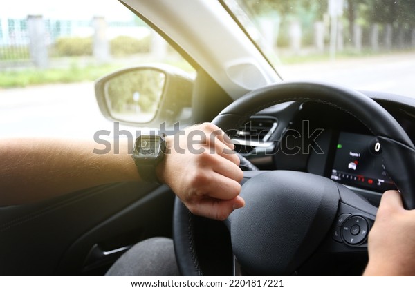 the man behind the wheel looks at the
time. Late for work, crowded roads, traffic
jams