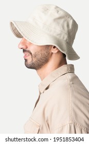Man In A Beige Bucket Hat And Shirt Fashion Studio Shoot