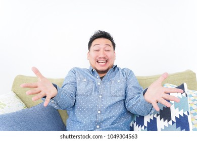 Man being surprised at home  - Powered by Shutterstock