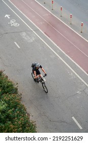 Man Bicycling On Cycling Road. Top Aerial View.