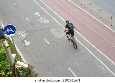 Man Bicycling On Cycling Road. Top Aerial View.