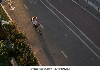 Man Bicycling On Cycling Road. Top Aerial View.