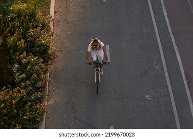 Man Bicycling On Cycling Road. Top Aerial View.