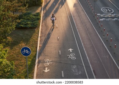 Man Bicycling On Cycling Road. Top Aerial View.