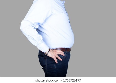 Man With A Big Belly And Overweight Is Wearing A Shirt And Jeans, Side View