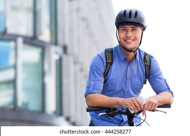 Man Biking In The City