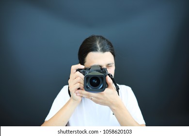 Man with a black camera