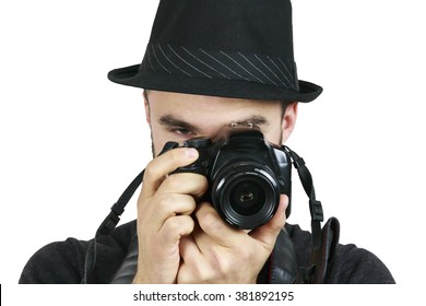 Man in Black Hat With Camera