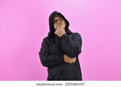 the man in the black jacket was contemplating - Shutterstock ID 2395481457
