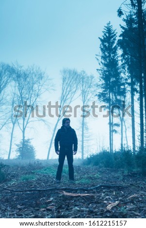 Similar – silhouette of man with poster that puts love